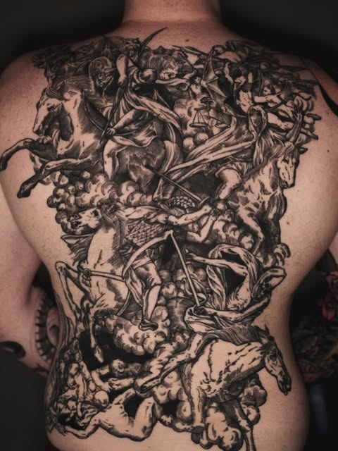 Large tattoo composition covering a client's back