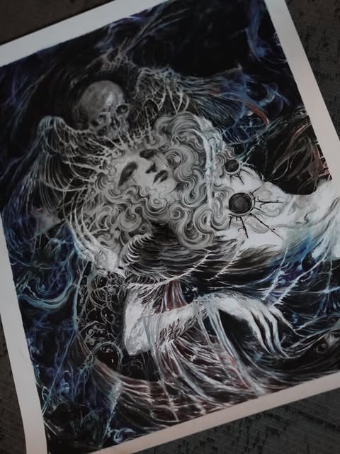 Detailed artwork on paper featuring a central figure